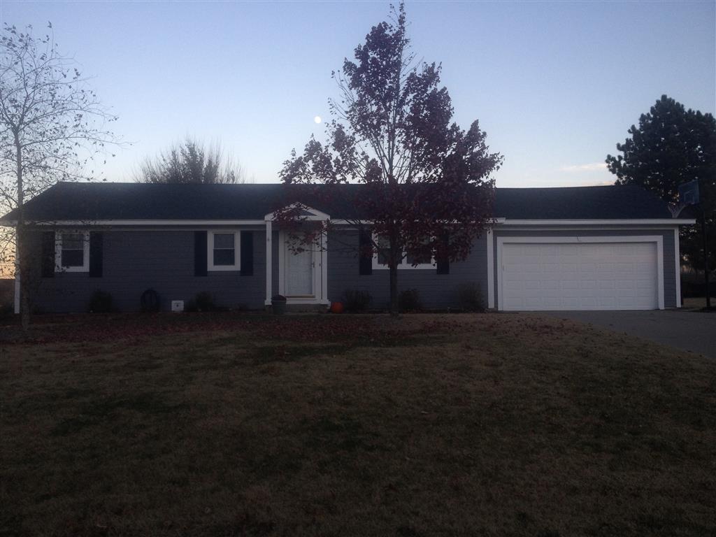 Image representing Gorilla Exteriors vinyl siding repair and installation services in Kansas City showcasing the completion of siding work done on the front of a ranch home.