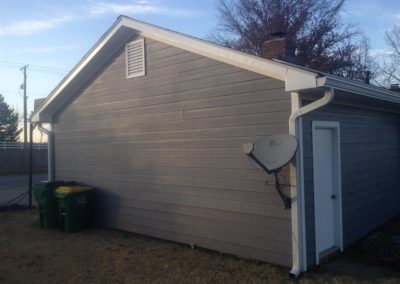 Image representing Gorilla Exteriors vinyl siding repair and installation services in Kansas City showcasing home with new siding on side of home.