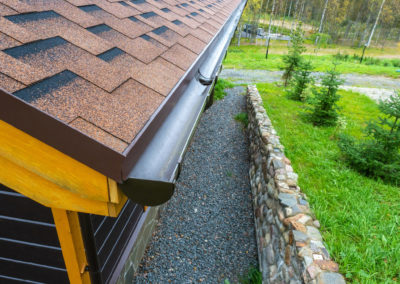 Holder gutter drainage system on the roof. Drain on the roof of the house. Roof drainage. Water drainage from the roof.