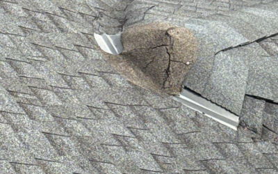 Resource Center 1 Roof with visible damage, including cracked shingles and exposed underlayment, highlighting the need for urgent roof leak repair in Kansas City.